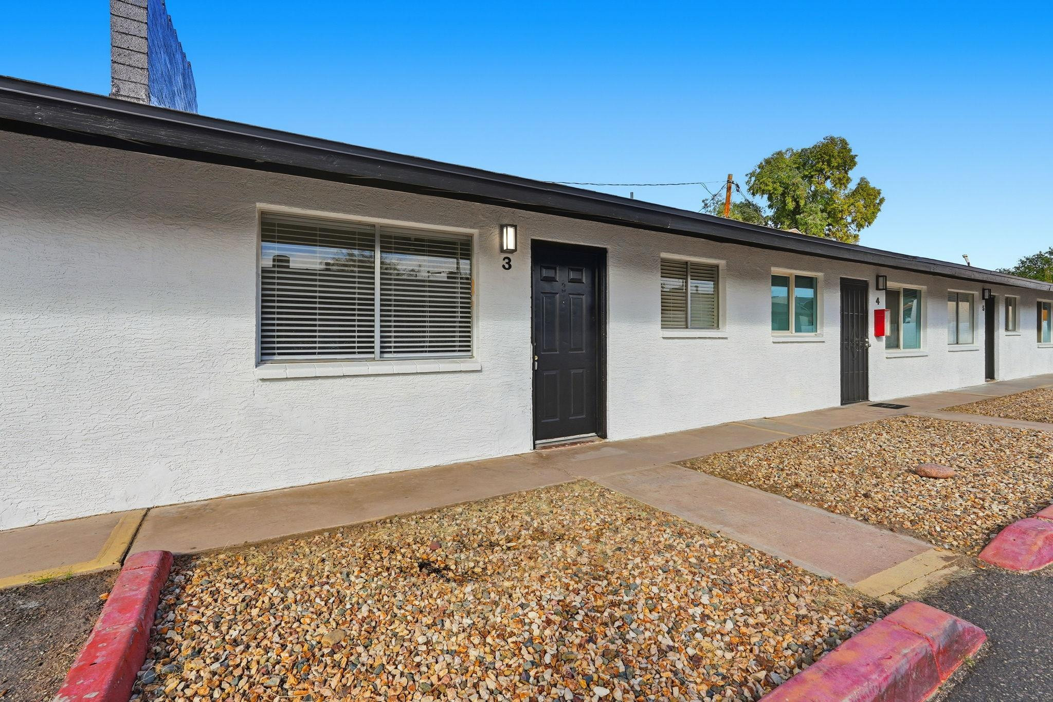 4329 North Longview Avenue, Unit 2 Phoenix, AZ 85014 - Photo 1 of 12 a front view of a house
