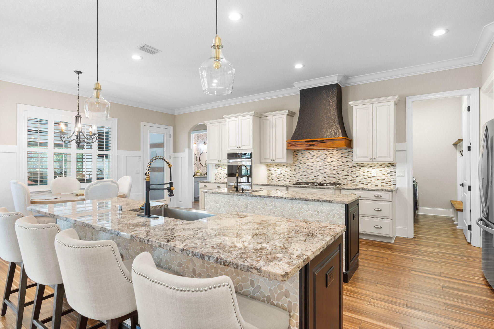 85 Garnet Place Destin, FL 32541 - Photo 14 of 50 a kitchen with granite countertop white cabinets and stainless steel appliances