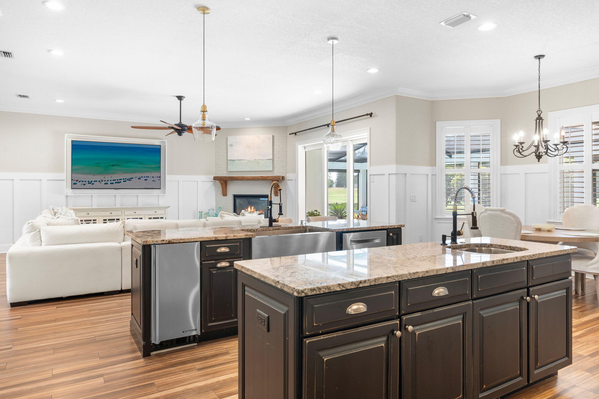 85 Garnet Place Destin, FL 32541 - Photo 15 of 50 a kitchen with a sink stove and wooden floor