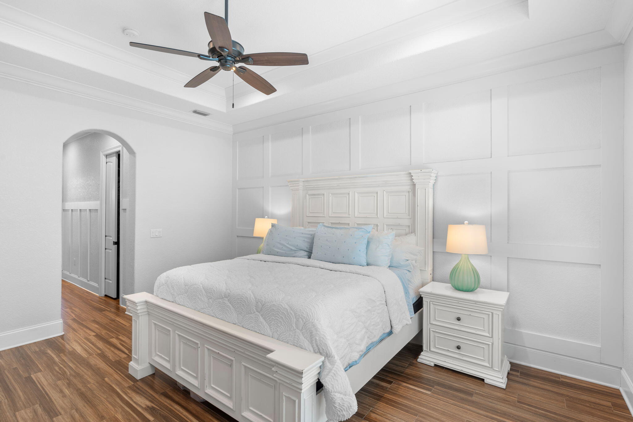 85 Garnet Place Destin, FL 32541 - Photo 21 of 50 a bedroom with a bed and a chandelier