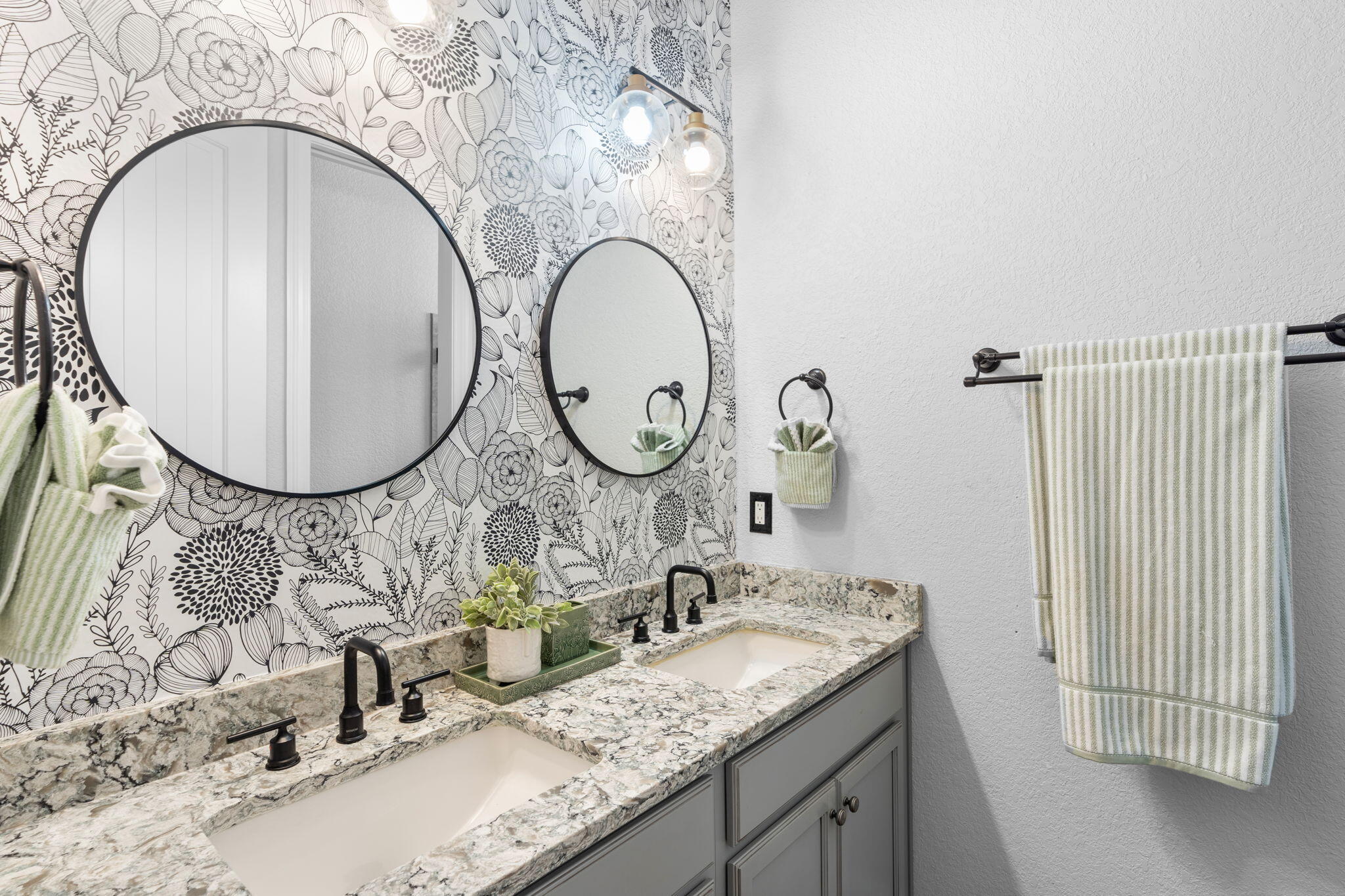 85 Garnet Place Destin, FL 32541 - Photo 26 of 50 a bathroom with a granite countertop double vanity and a mirror