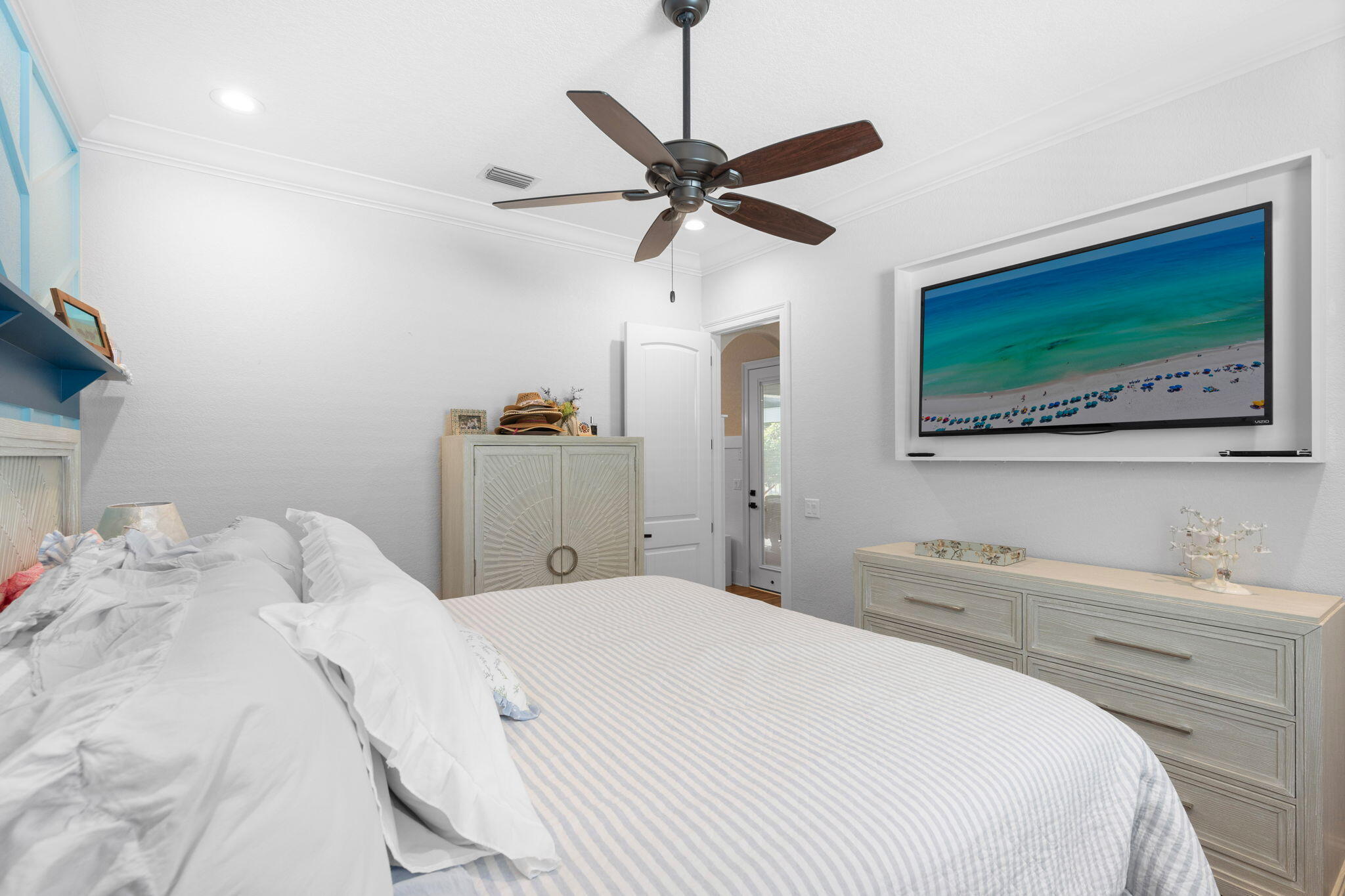 85 Garnet Place Destin, FL 32541 - Photo 29 of 50 a bedroom with a bed and a flat screen tv
