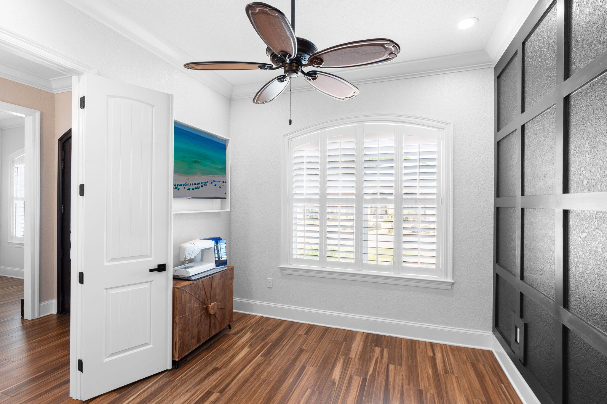 85 Garnet Place Destin, FL 32541 - Photo 30 of 50 a view of an empty room with a window and wooden floor