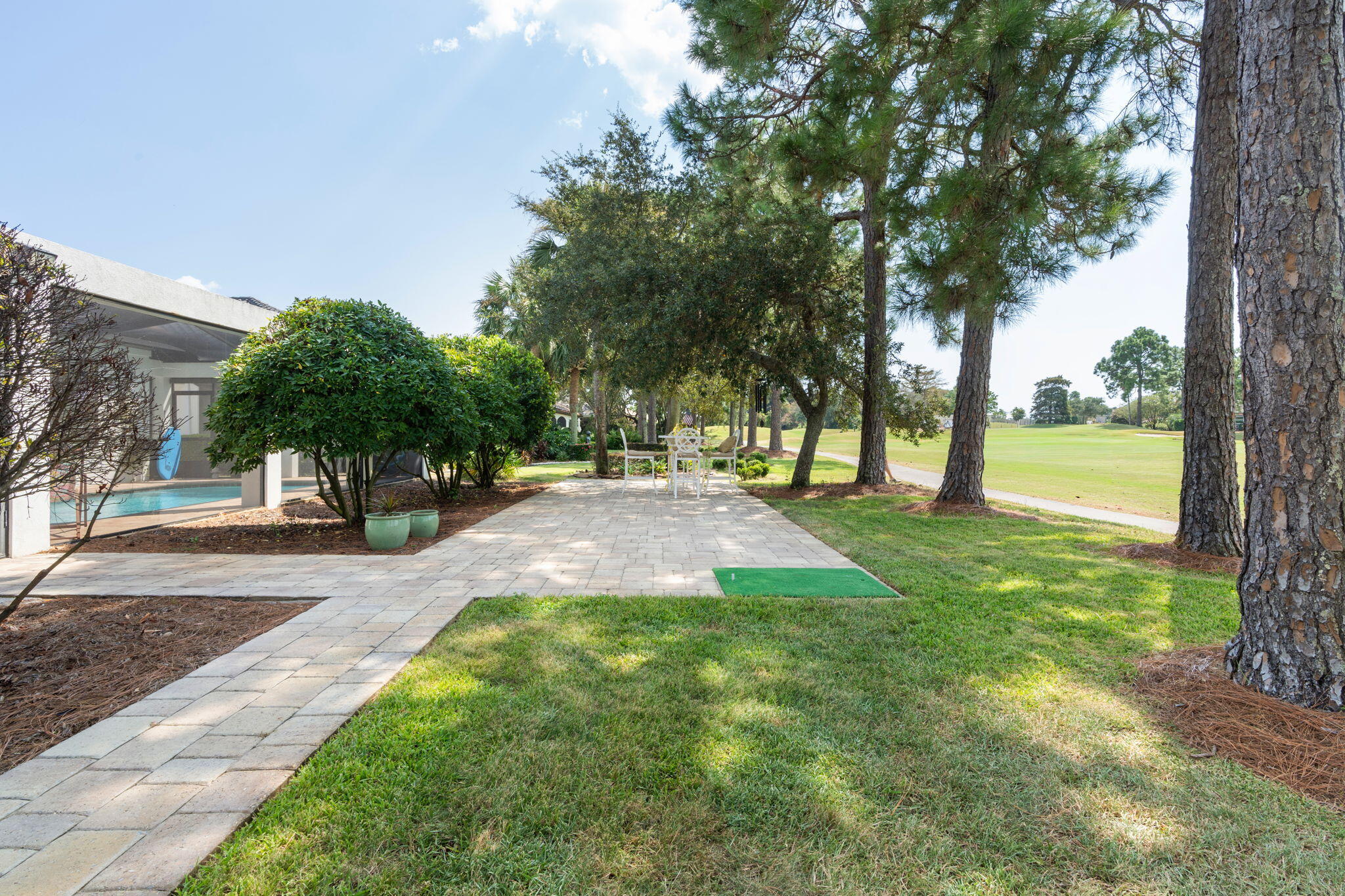 85 Garnet Place Destin, FL 32541 - Photo 40 of 50 a view of a yard with palm trees