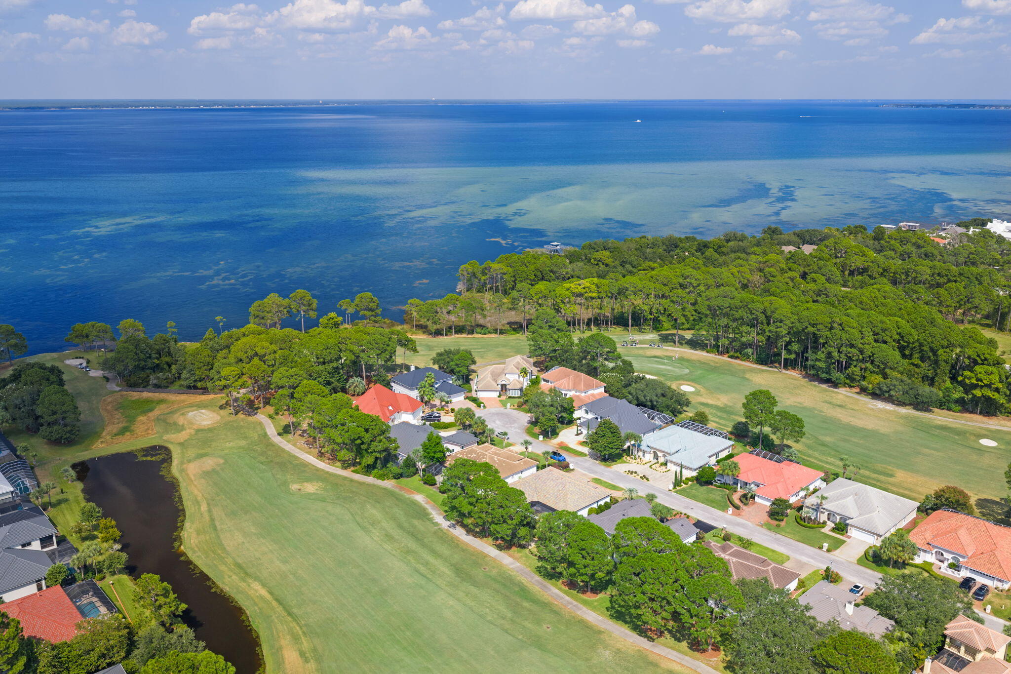 85 Garnet Place Destin, FL 32541 - Photo 42 of 50 a view of a garden with an ocean