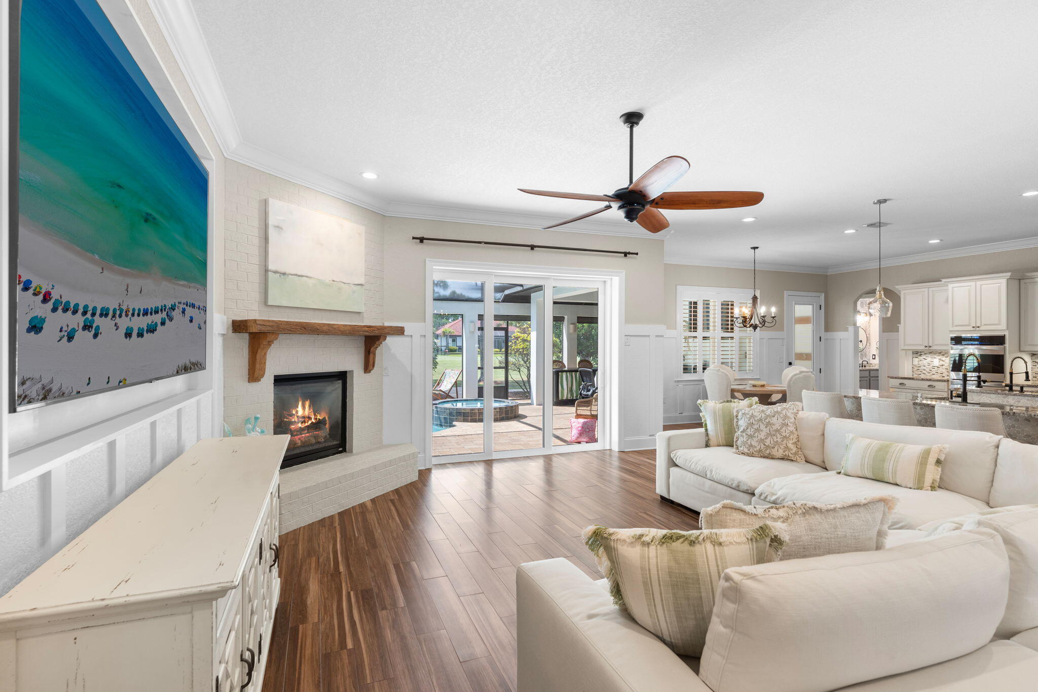 85 Garnet Place Destin, FL 32541 - Photo 8 of 50 a living room with furniture a fireplace and a flat screen tv