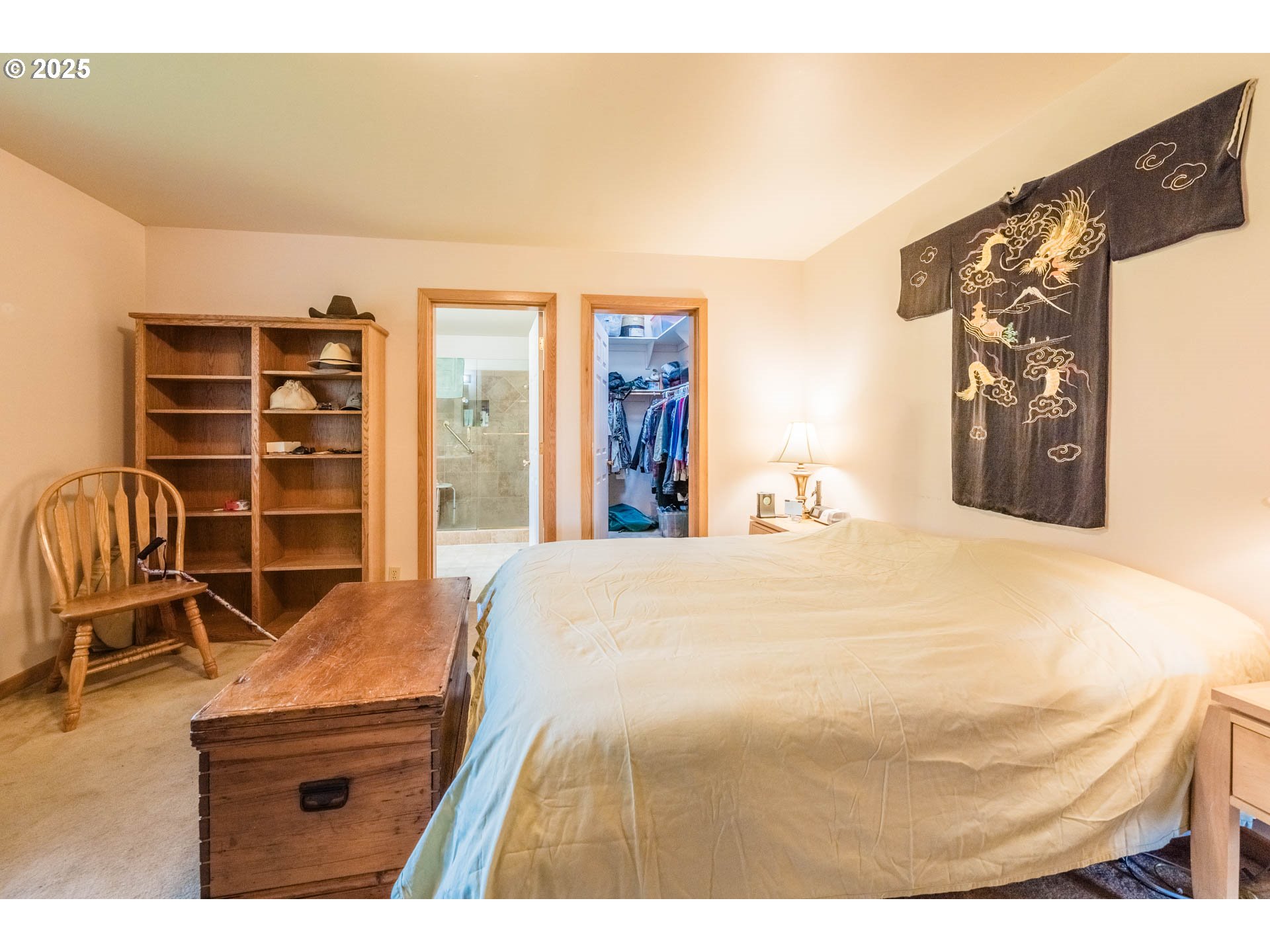 117 Southwest 66th South Beach, OR 97366 - Photo 17 of 40 a bedroom with a bed and dresser