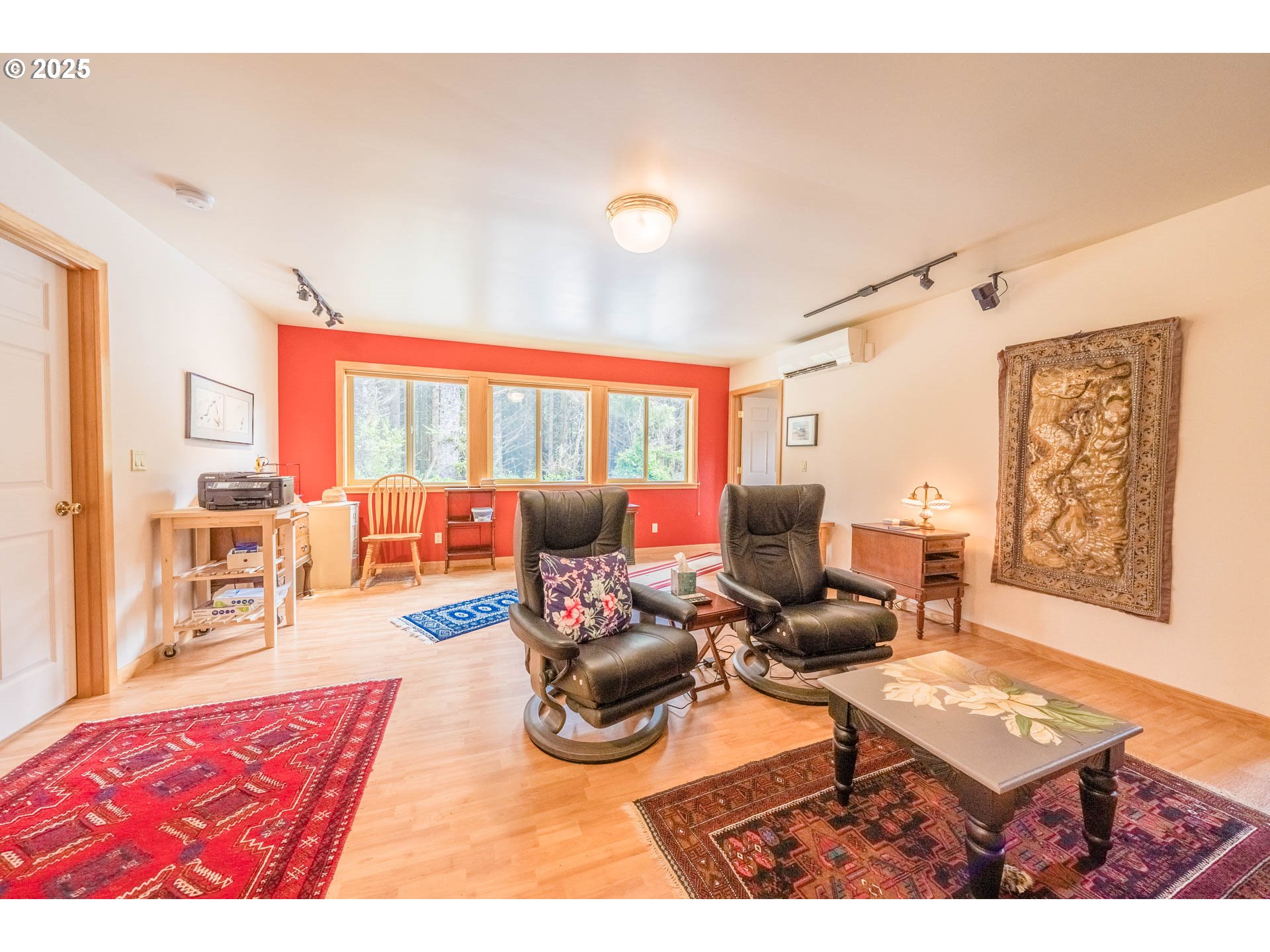 117 Southwest 66th South Beach, OR 97366 - Photo 24 of 40 a living room with furniture a rug and a table