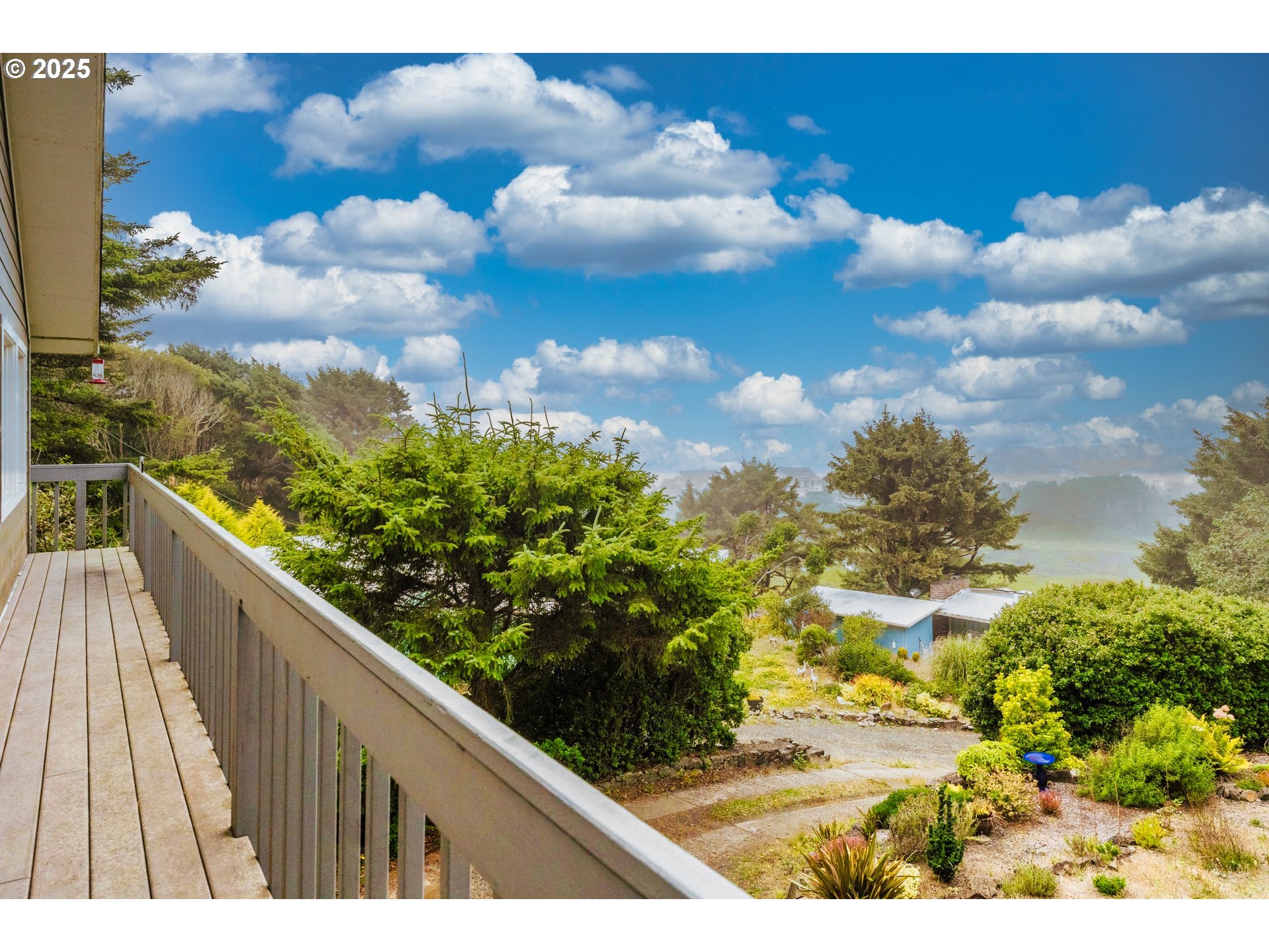 117 Southwest 66th South Beach, OR 97366 - Photo 5 of 40 a view of balcony with wooden floor