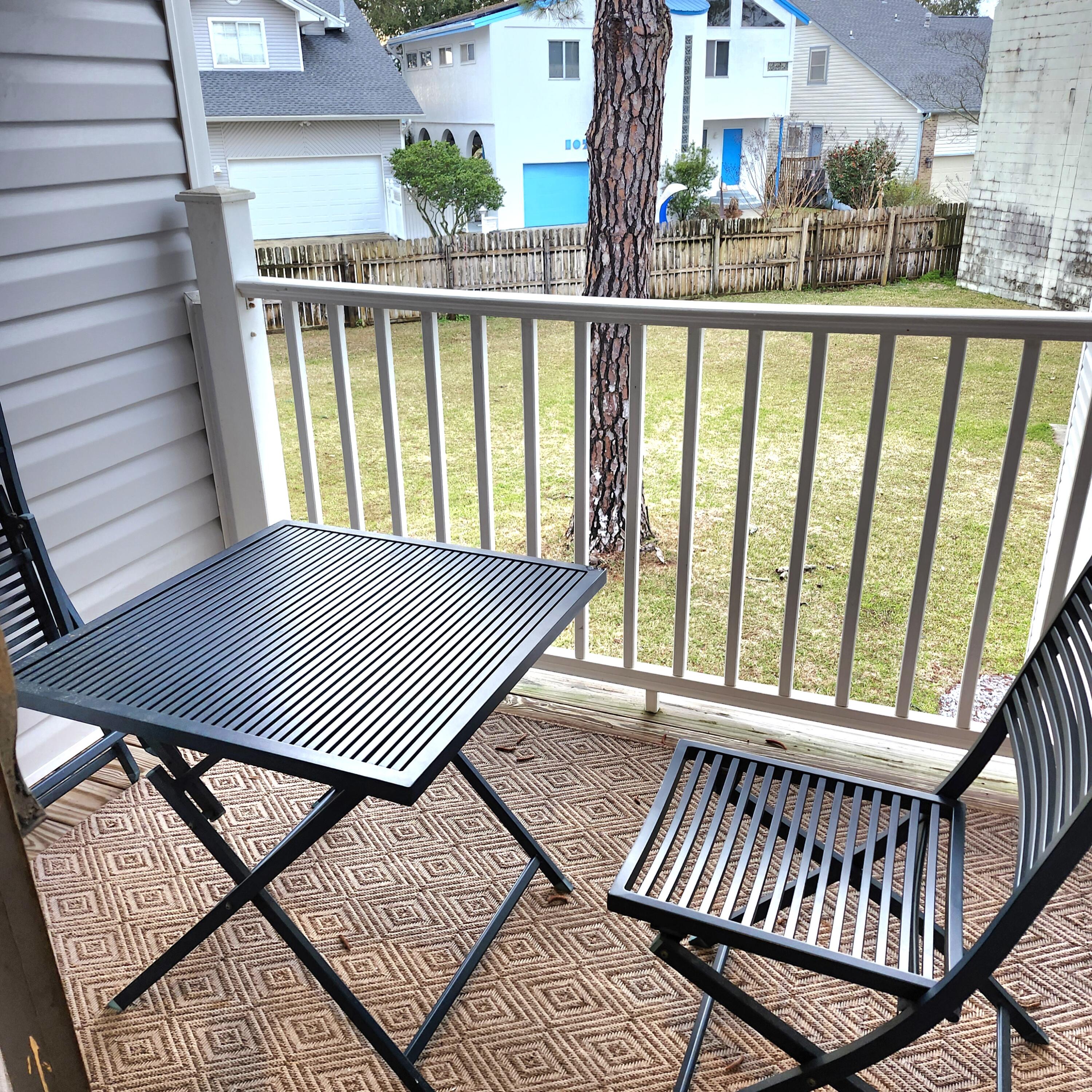 101 Old Ferry Road, Unit 8D Shalimar, FL 32579 - Photo 7 of 21 a view of a balcony with wooden floor