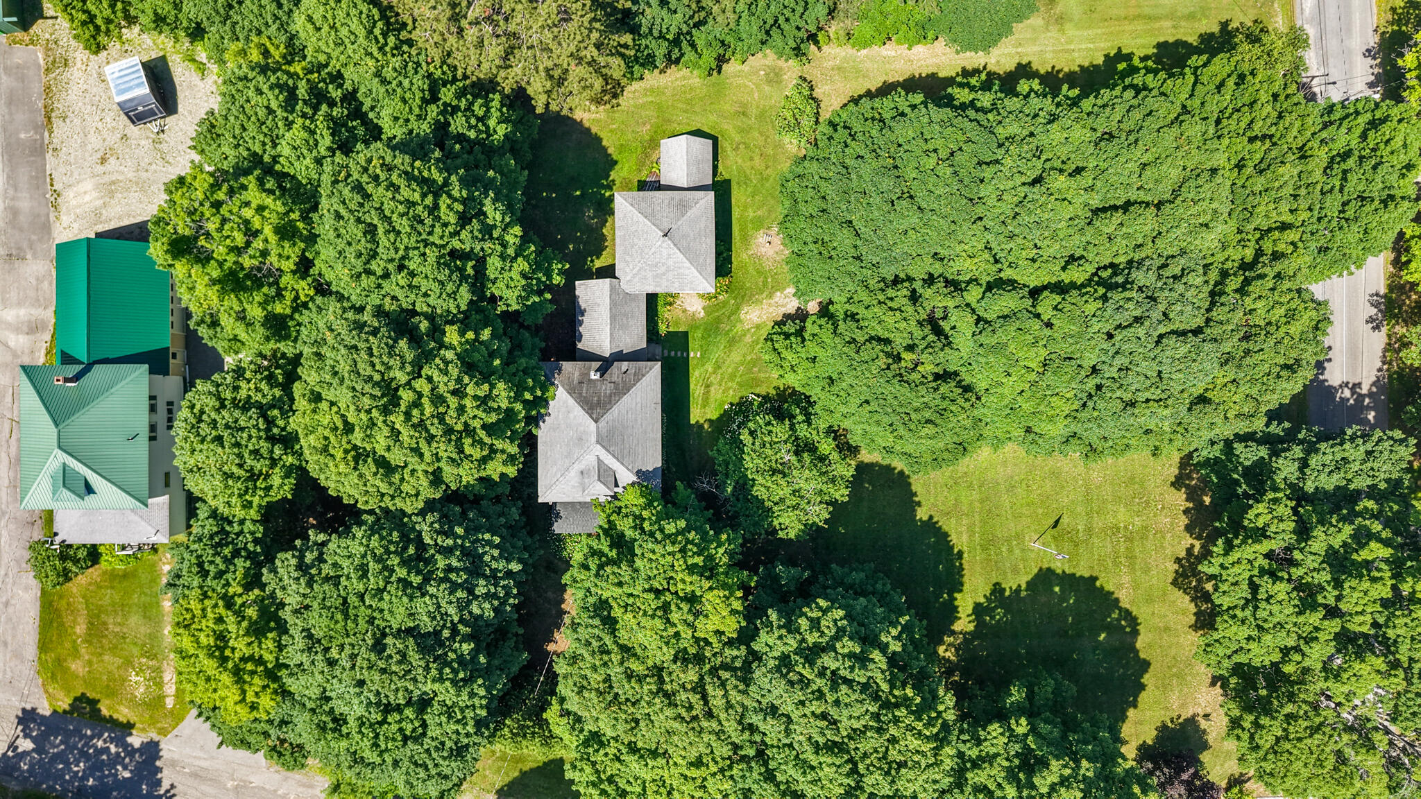 32 Willow Street Patten, ME 04765 - Photo 11 of 36 dji_fly_20260712_135934_0744_17838794691