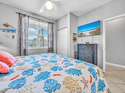 a view of a pathway of a house with wooden fence