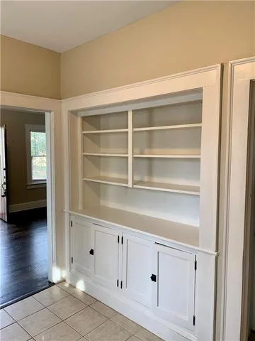 a view of a hallway with closet