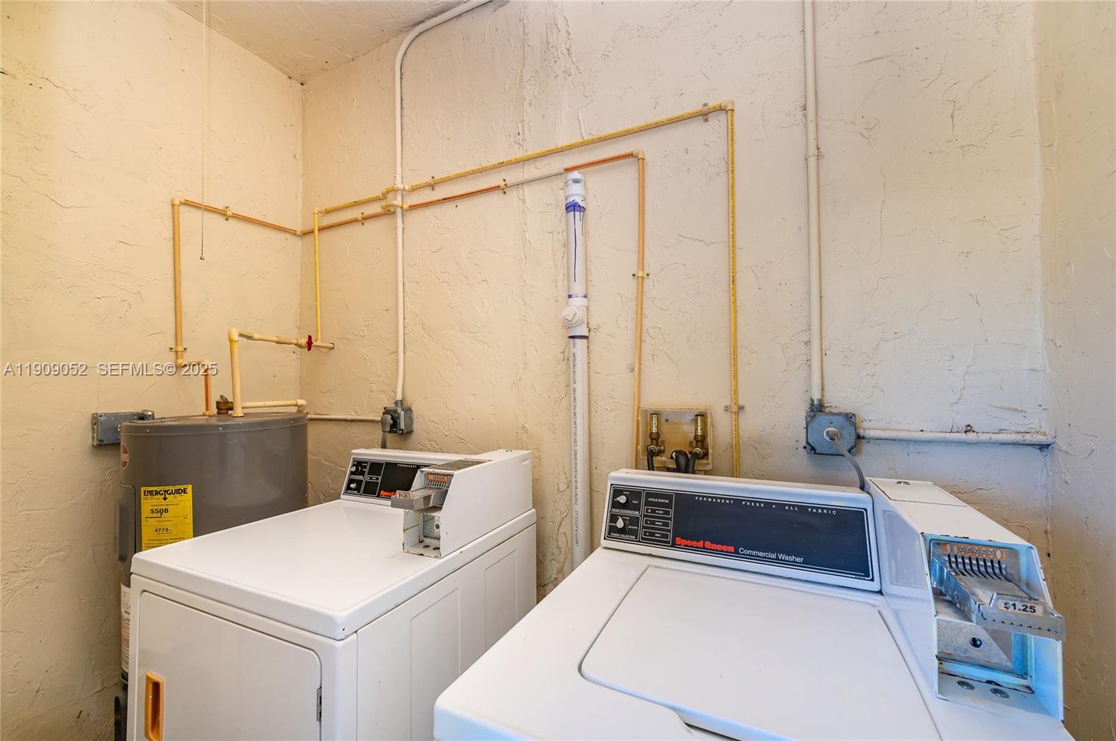 520 Southwest Krome Terrace Homestead, FL 33030 - Photo 14 of 17 a room with a bed a couch and a potted plant