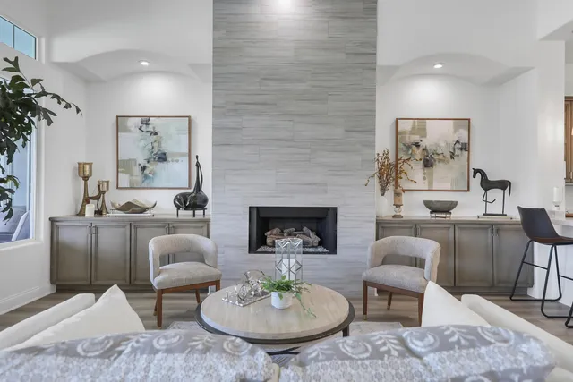 a living room with furniture and a table