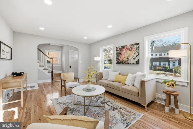 a view of an entryway with wooden floor