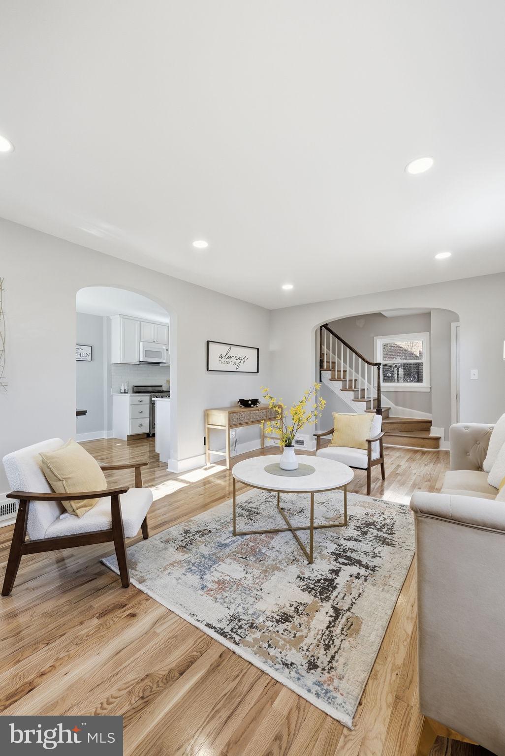 8712 Geren Road Silver Spring, MD 20901 - Photo 16 of 72 a living room with furniture and a table