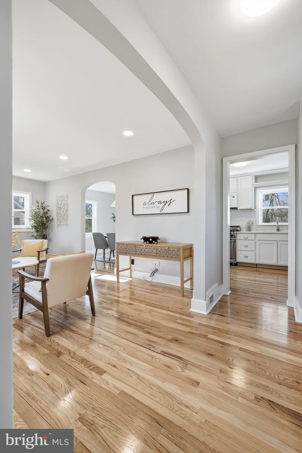8712 Geren Road Silver Spring, MD 20901 - Photo 20 of 72 a living room with furniture and wooden floor