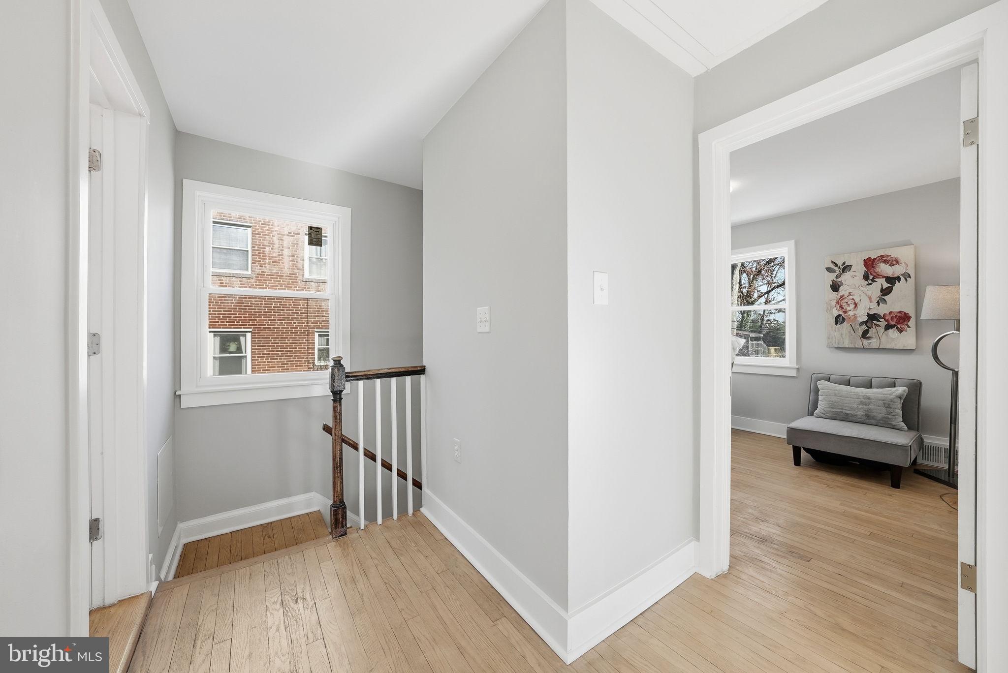 8712 Geren Road Silver Spring, MD 20901 - Photo 35 of 72 a view of a livingroom with furniture and hardwood floor