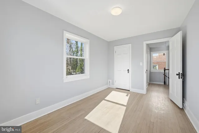 a bathroom with a shower and a toilet