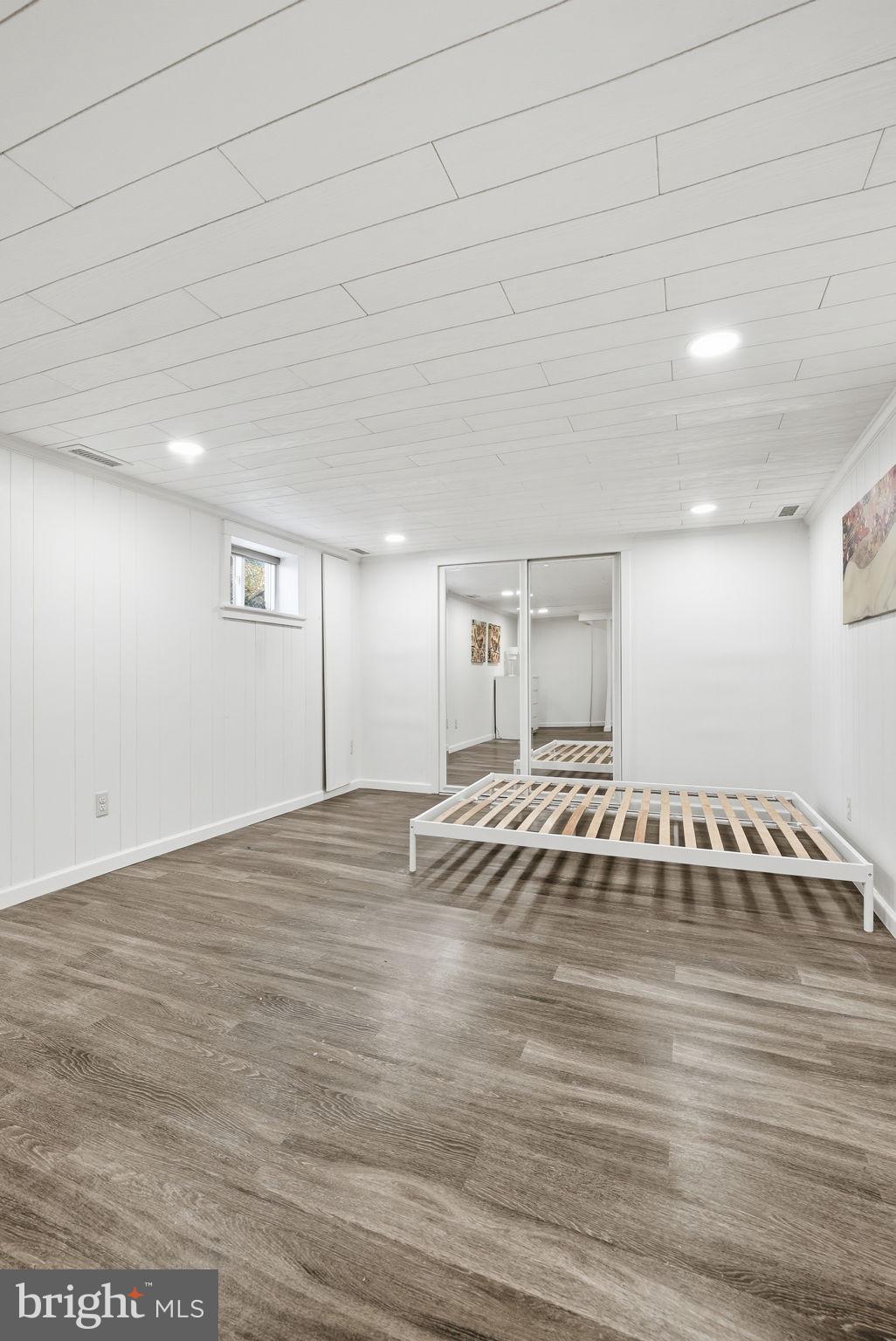 8712 Geren Road Silver Spring, MD 20901 - Photo 51 of 72 a view of empty room with wooden floor