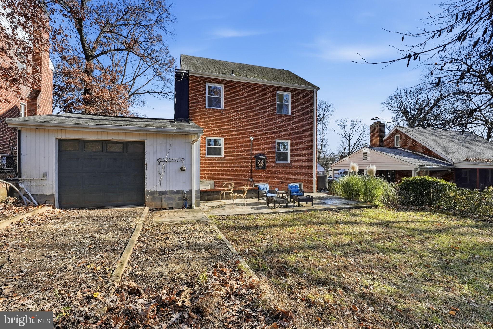 8712 Geren Road Silver Spring, MD 20901 - Photo 69 of 72 a front view of a house with a yard
