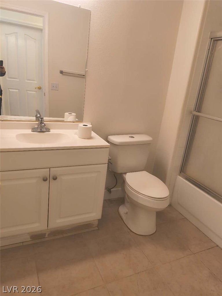 9725 Pima Point Avenue Las Vegas, NV 89147 - Photo 28 of 35 Functional full bathroom with practical vanity and shower enclosure.