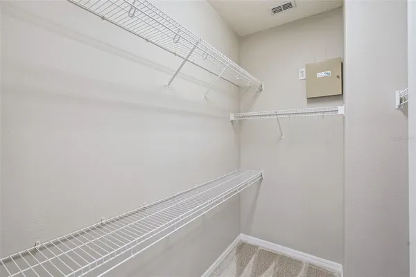 a view of small space with racks on the wall