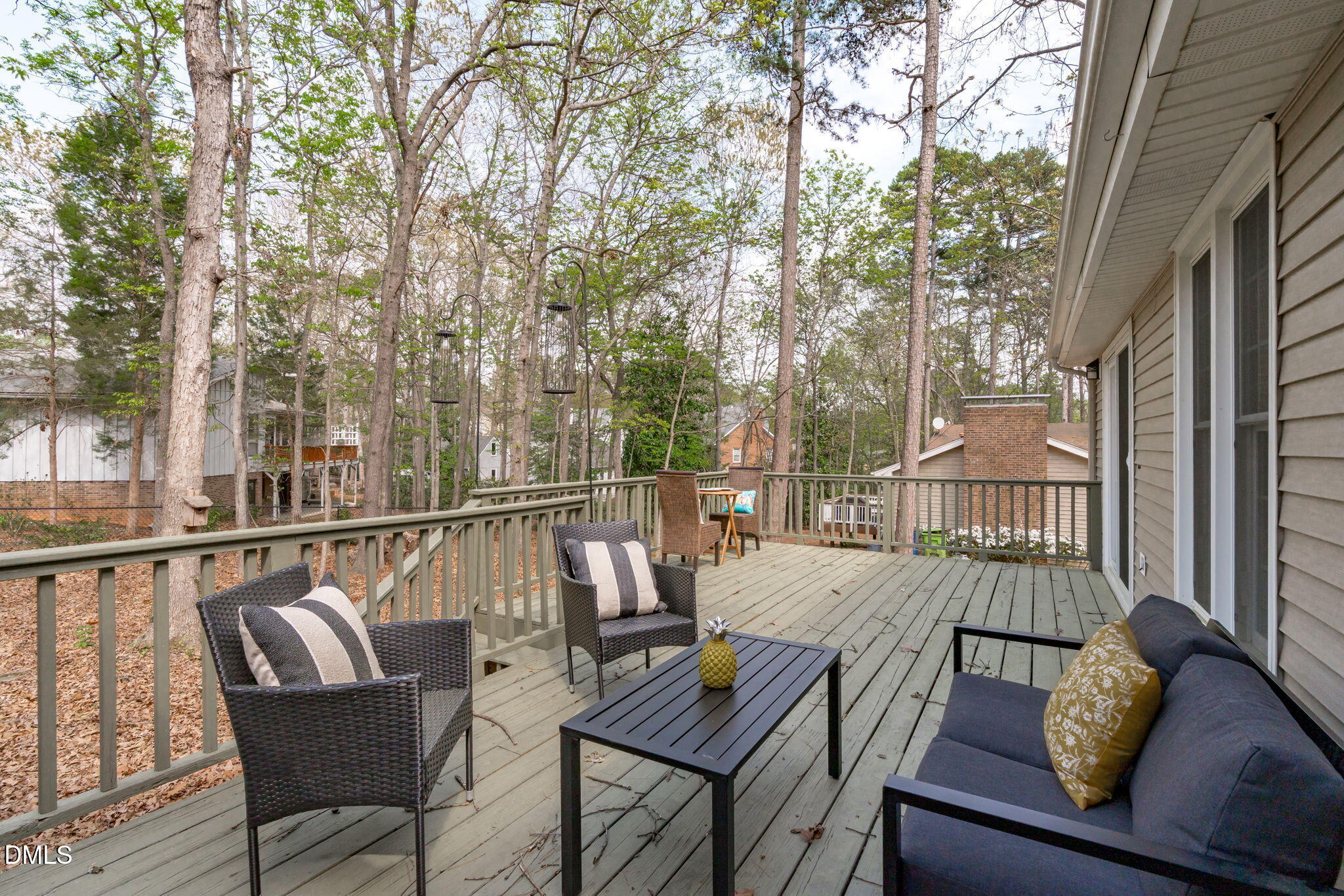 3304 Wade Avenue Raleigh, NC 27607 - Photo 30 of 38 a view of balcony with furniture and wooden deck
