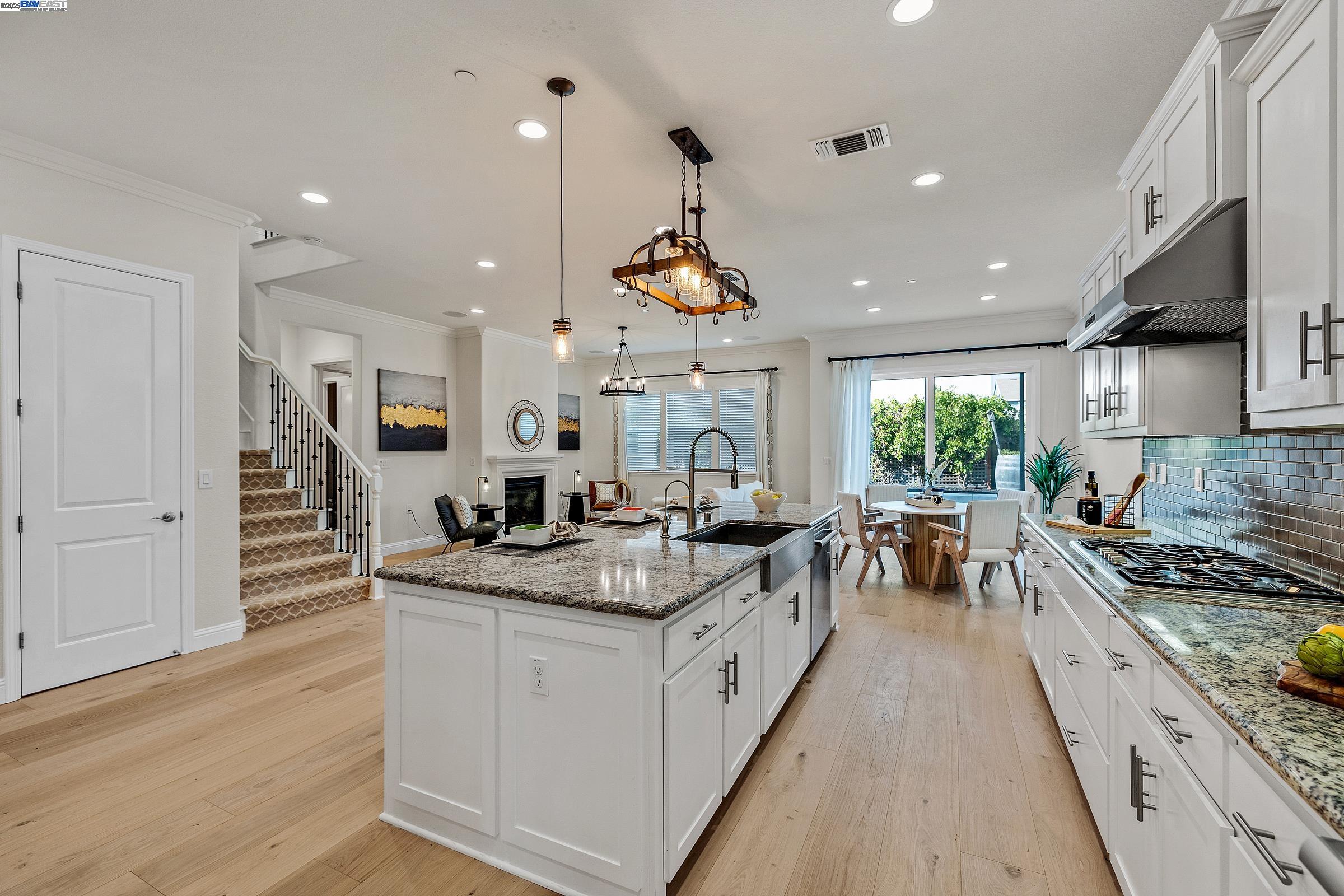 4519 Spring Mountain Way Dublin, CA 94568 - Photo 13 of 52 a kitchen with sink stove and cabinets