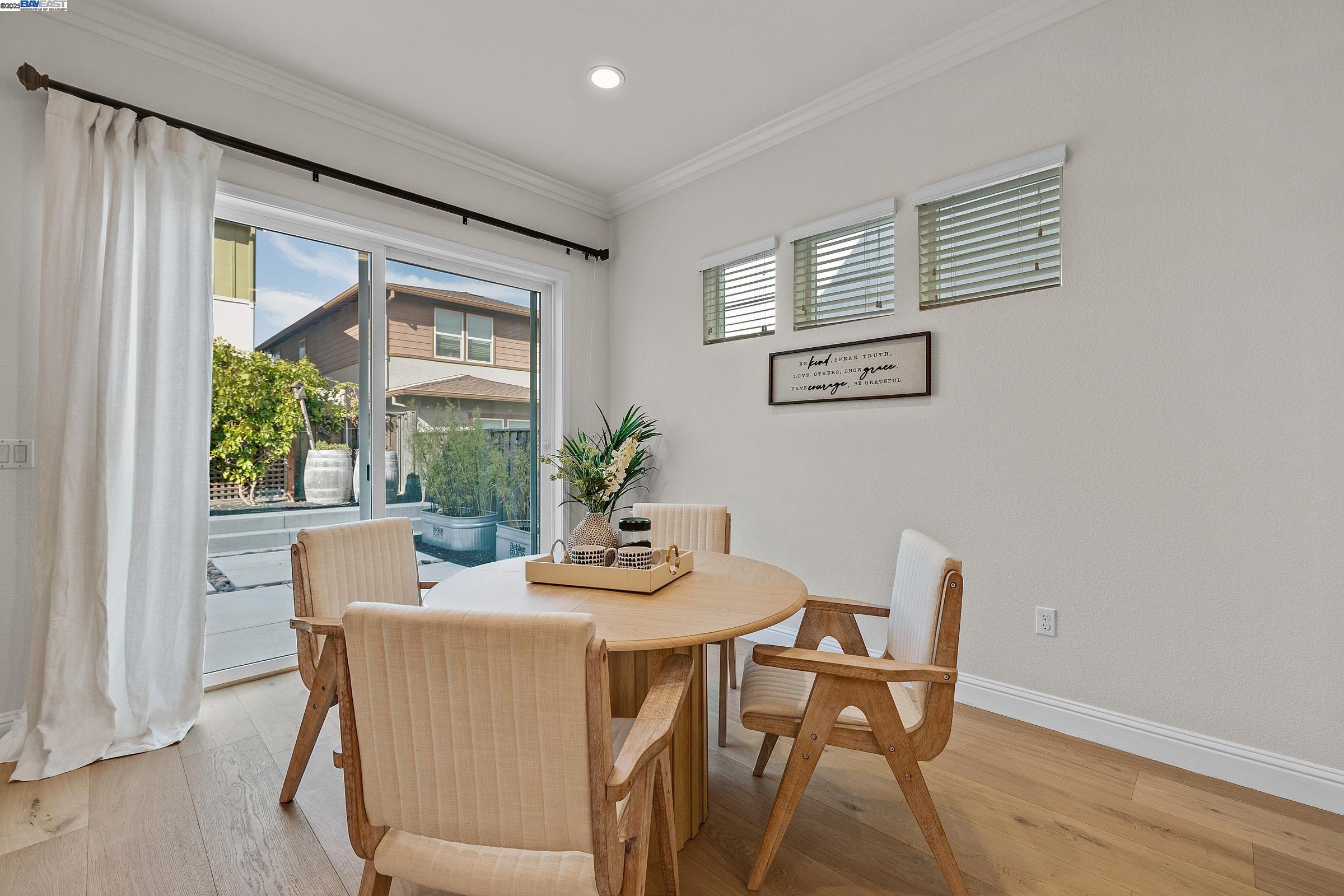 4519 Spring Mountain Way Dublin, CA 94568 - Photo 14 of 52 a dining room with furniture and window