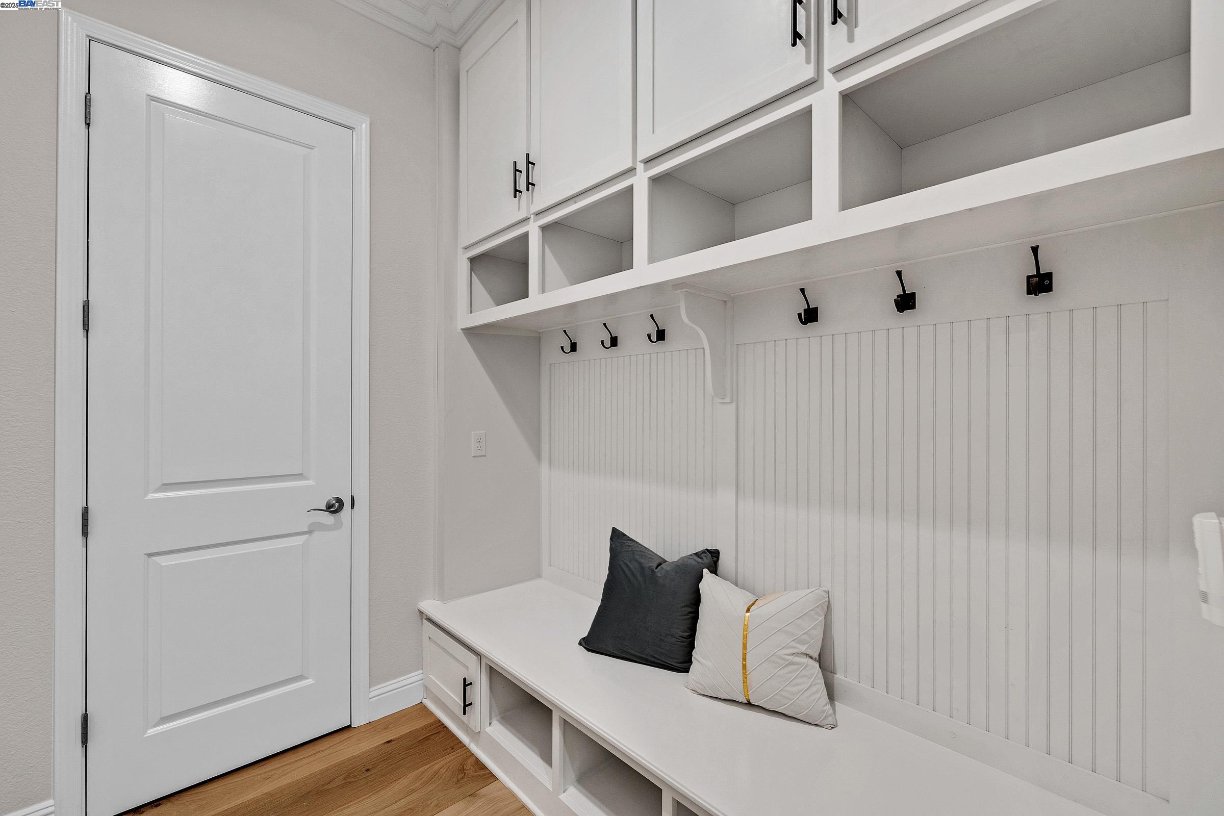 4519 Spring Mountain Way Dublin, CA 94568 - Photo 17 of 52 a bedroom with a bed and wooden floor