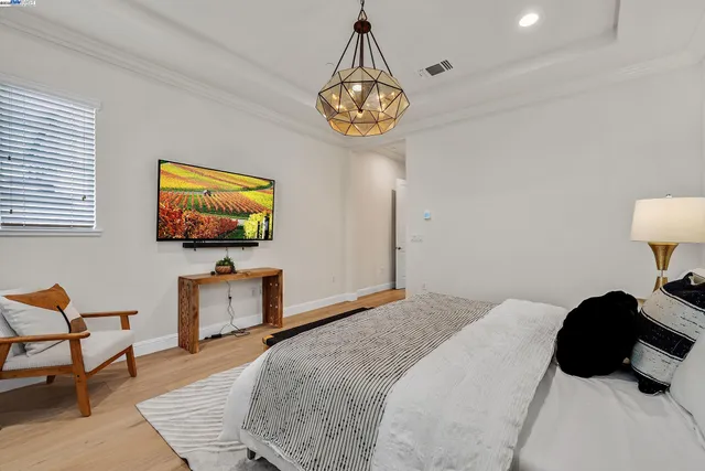 a spacious bathroom with a double vanity sink mirror double and bathtub