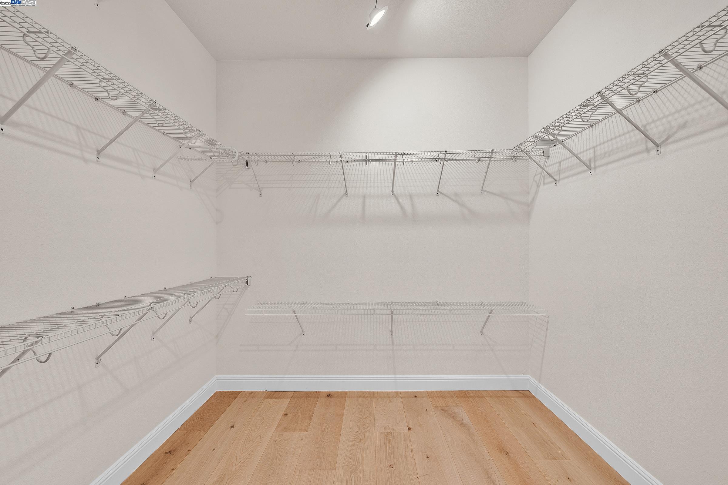 4519 Spring Mountain Way Dublin, CA 94568 - Photo 22 of 52 a view of a room with racks on the wall