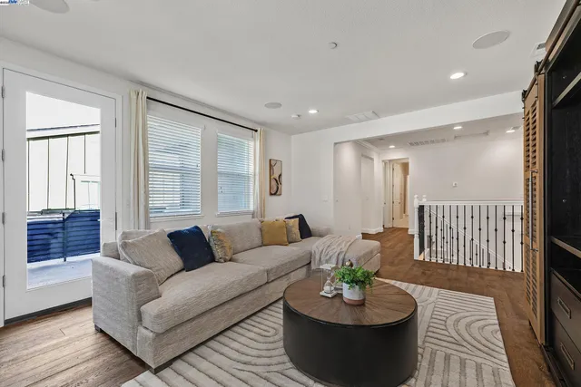 a view of entryway with wooden floor
