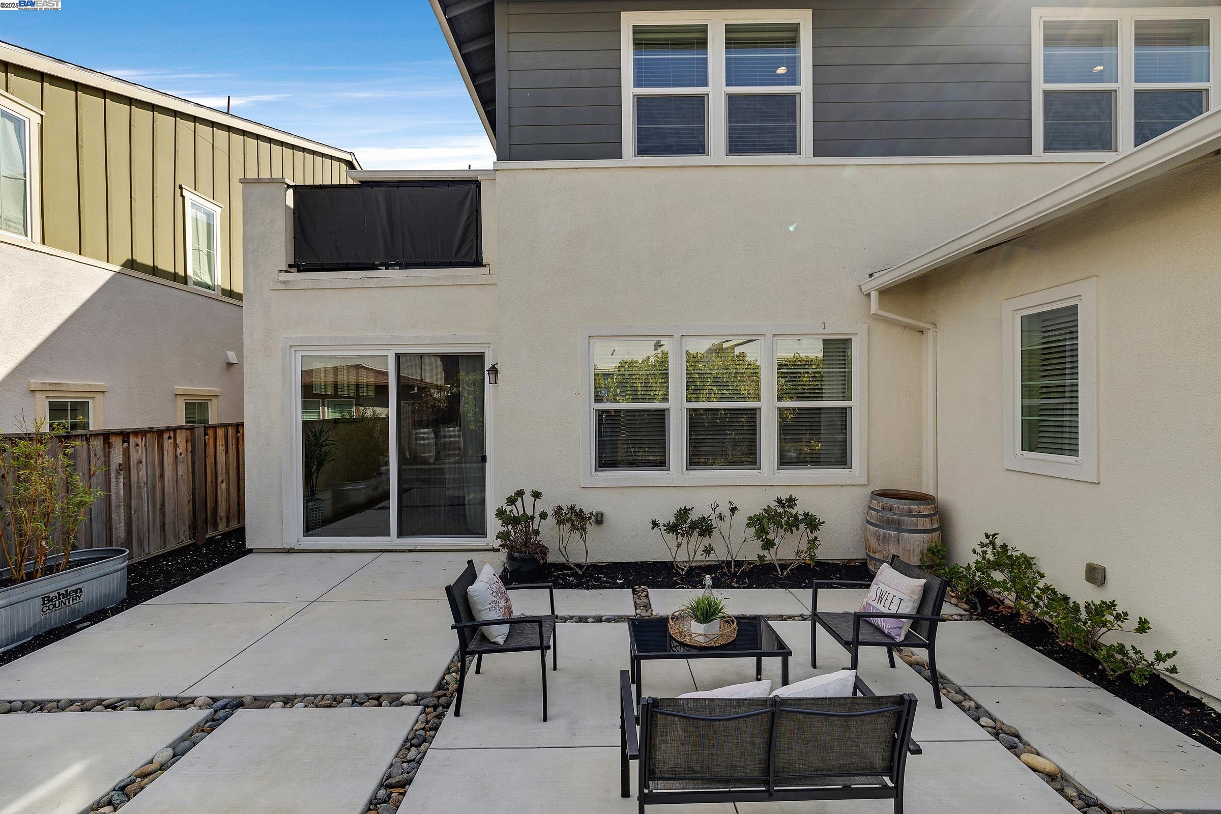 4519 Spring Mountain Way Dublin, CA 94568 - Photo 35 of 52 a view of a patio with table and chairs