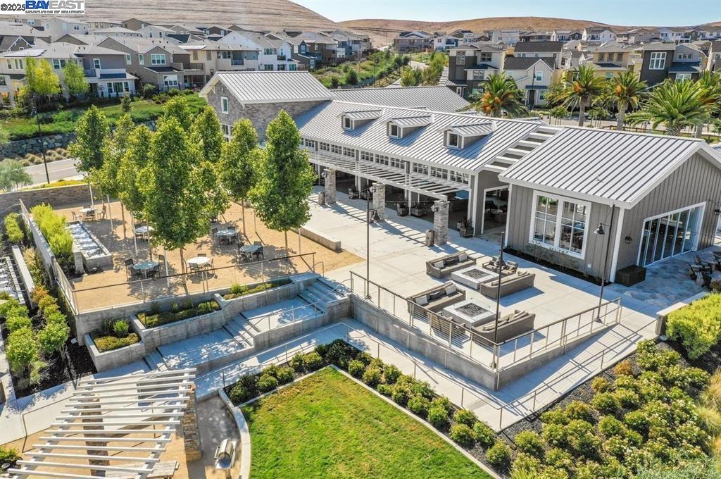 4519 Spring Mountain Way Dublin, CA 94568 - Photo 44 of 52 an aerial view of a house with a garden and lake view