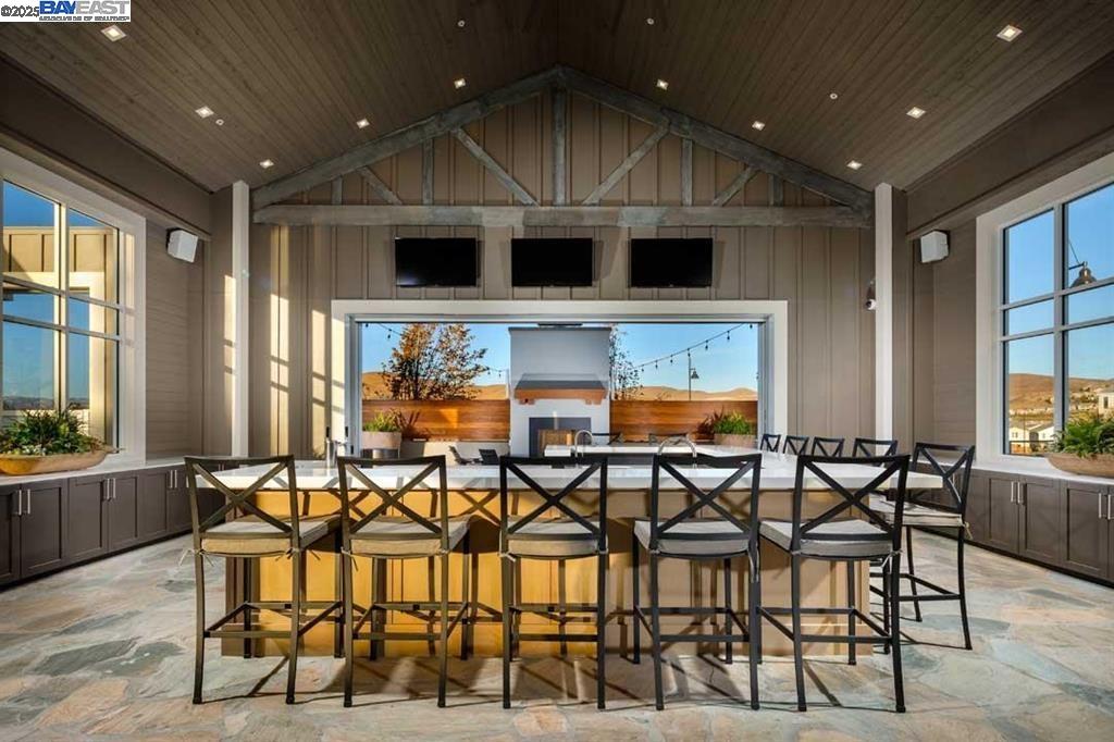 4519 Spring Mountain Way Dublin, CA 94568 - Photo 47 of 52 a view of a dining room with furniture and windows