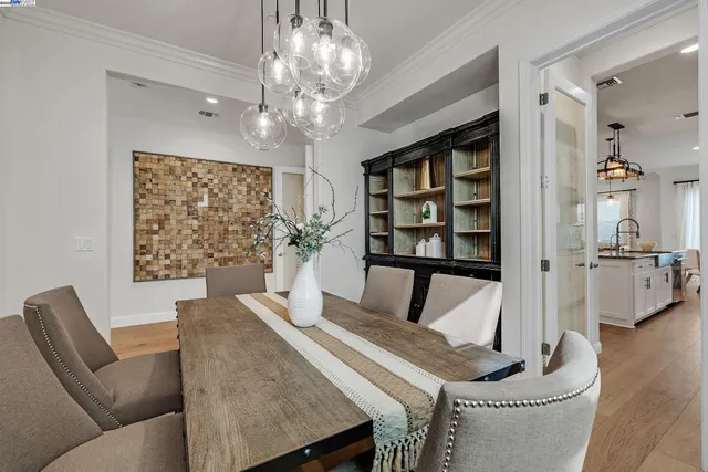 a kitchen with counter top space a sink stainless steel appliances and cabinets