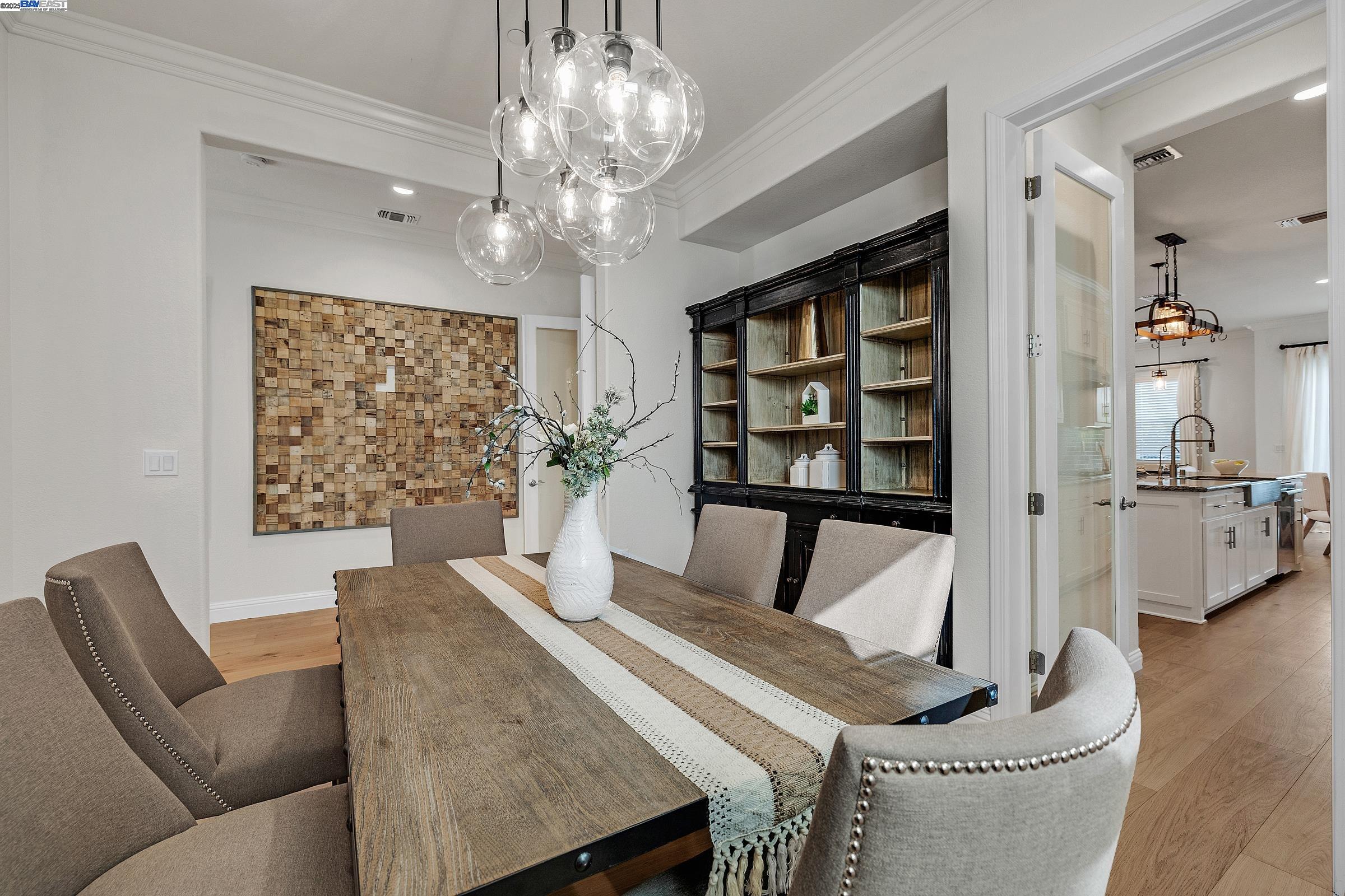 4519 Spring Mountain Way Dublin, CA 94568 - Photo 8 of 52 a living room with furniture and a chandelier