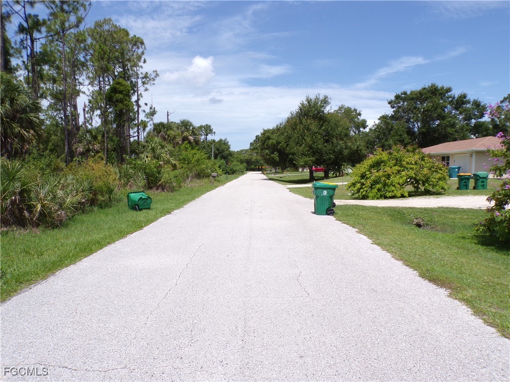 23413 Patera Avenue Punta Gorda, FL 33980 - Photo 11 of 13 a view of a street with a houses