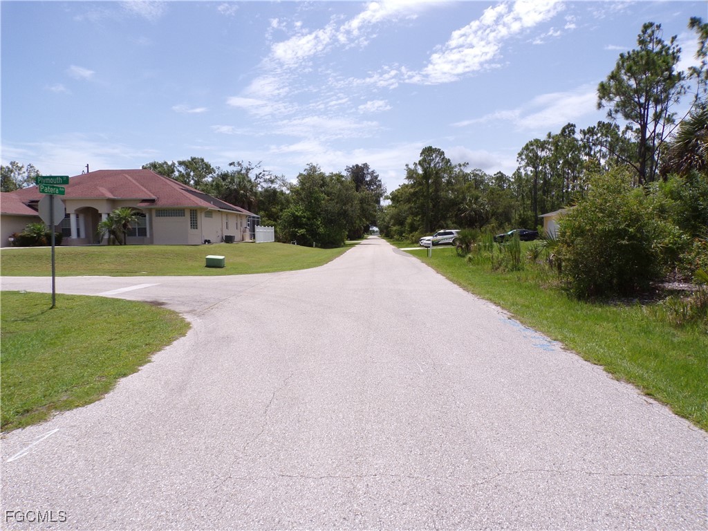 23413 Patera Avenue Punta Gorda, FL 33980 - Photo 10 of 13 a view of outdoor space with playground and green space