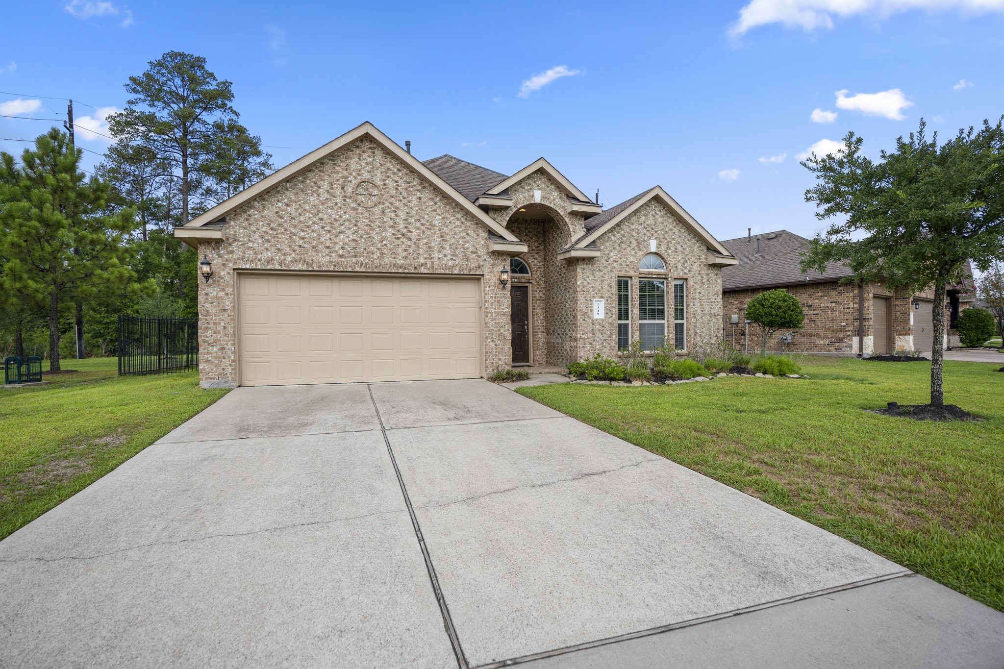 5319 Claymore Meadow Lane Spring, TX 77389 - Photo 2 of 34 a front view of house with yard and green space
