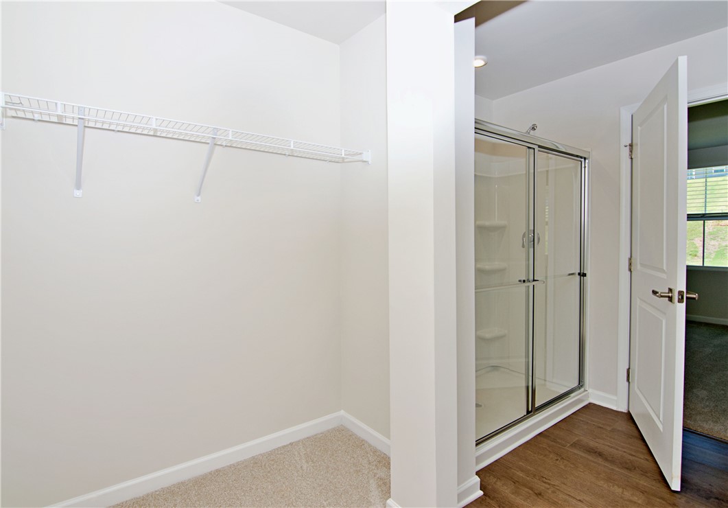 723 Peridot Way Westminster, SC 29693 - Photo 24 of 45 A well-appointed closet and shower combo maximize space and utility.