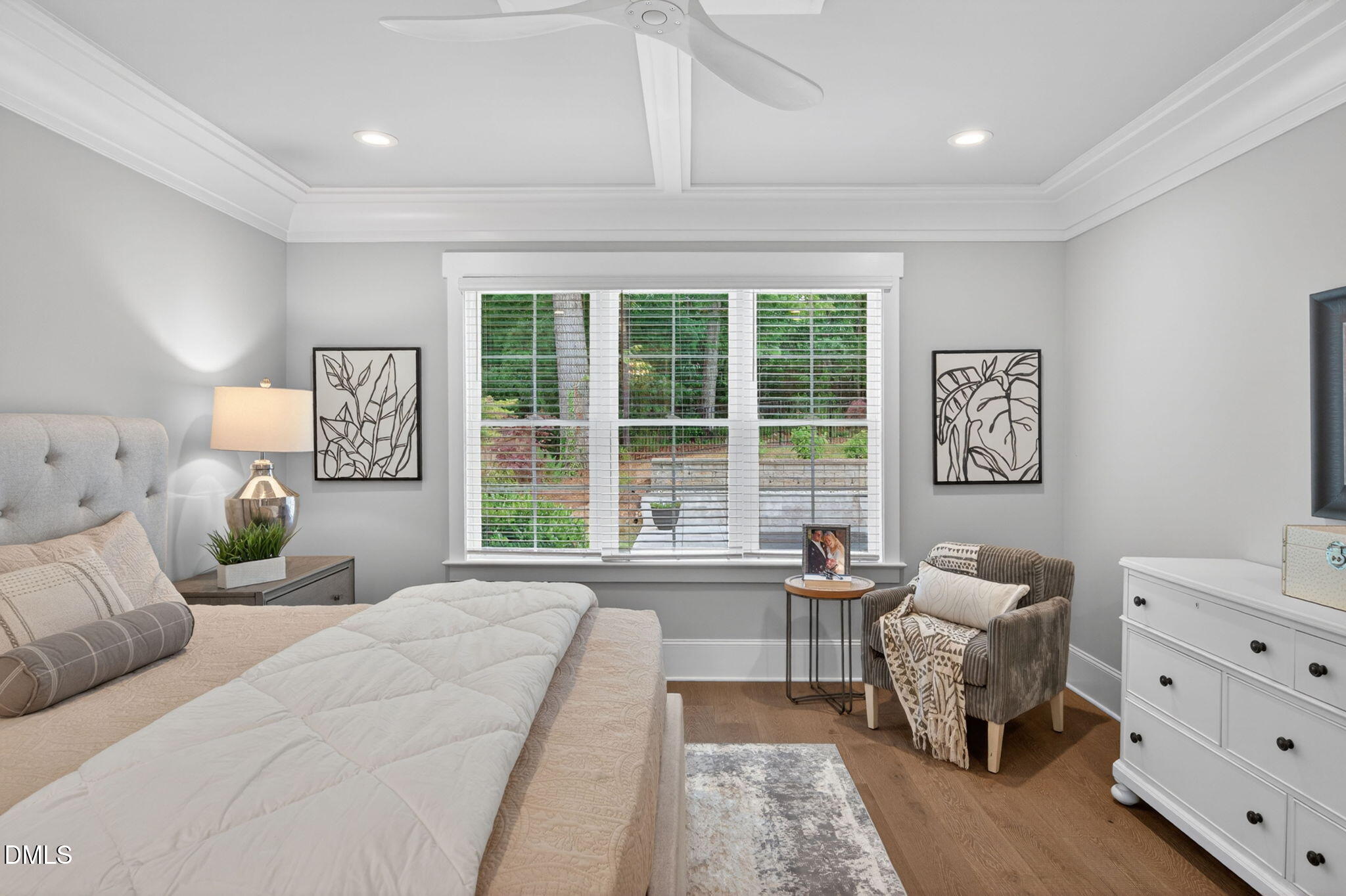 3417 Edgemont Drive Raleigh, NC 27612 - Photo 31 of 83 a spacious bedroom with a bed and a large window