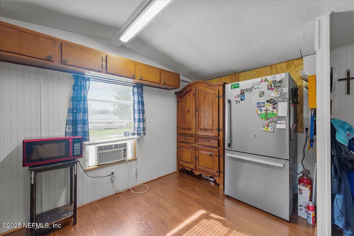4961 Bent Twig Road Middleburg, FL 32068 - Photo 5 of 17 a kitchen with refrigerator and window