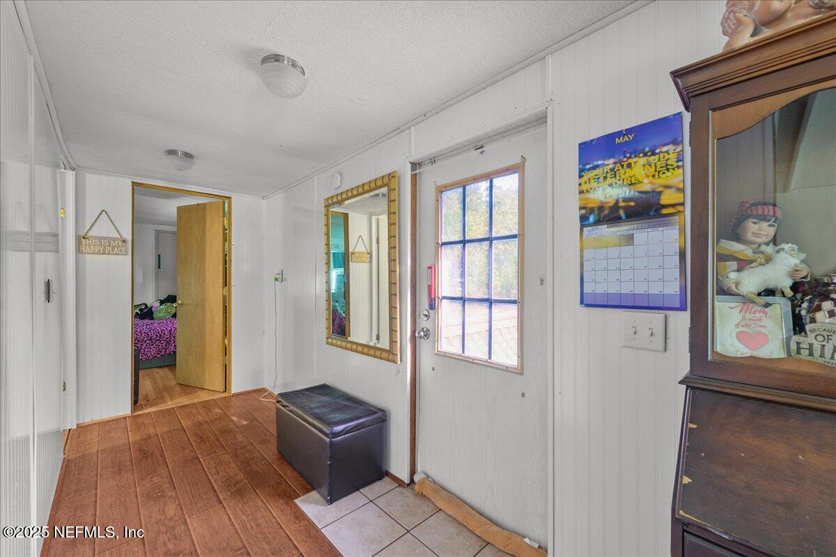 4961 Bent Twig Road Middleburg, FL 32068 - Photo 9 of 17 a view of an entryway with wooden floor