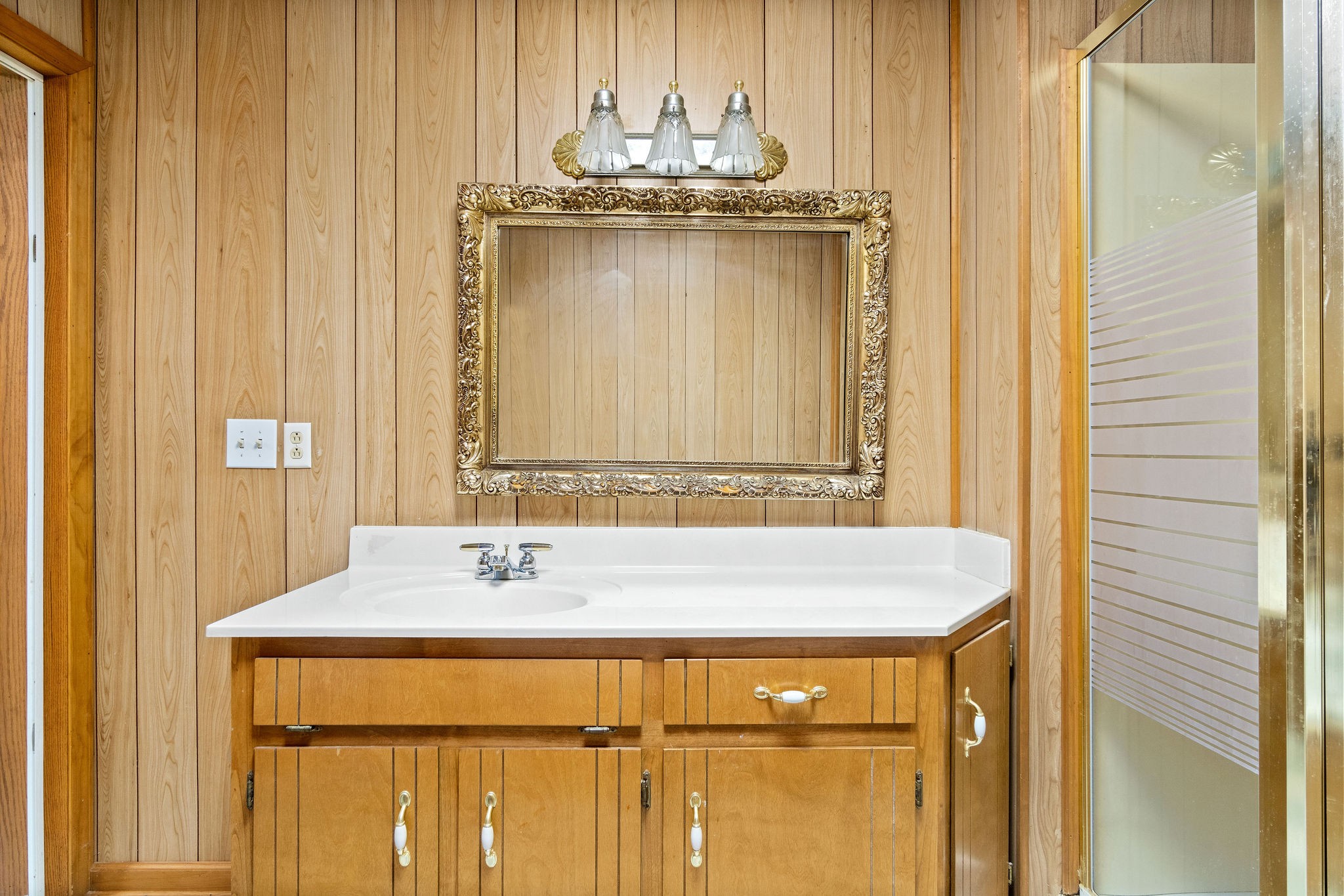 752 Highway 13 Cunningham, TN 37052 - Photo 17 of 32 a bathroom with a sink and a mirror