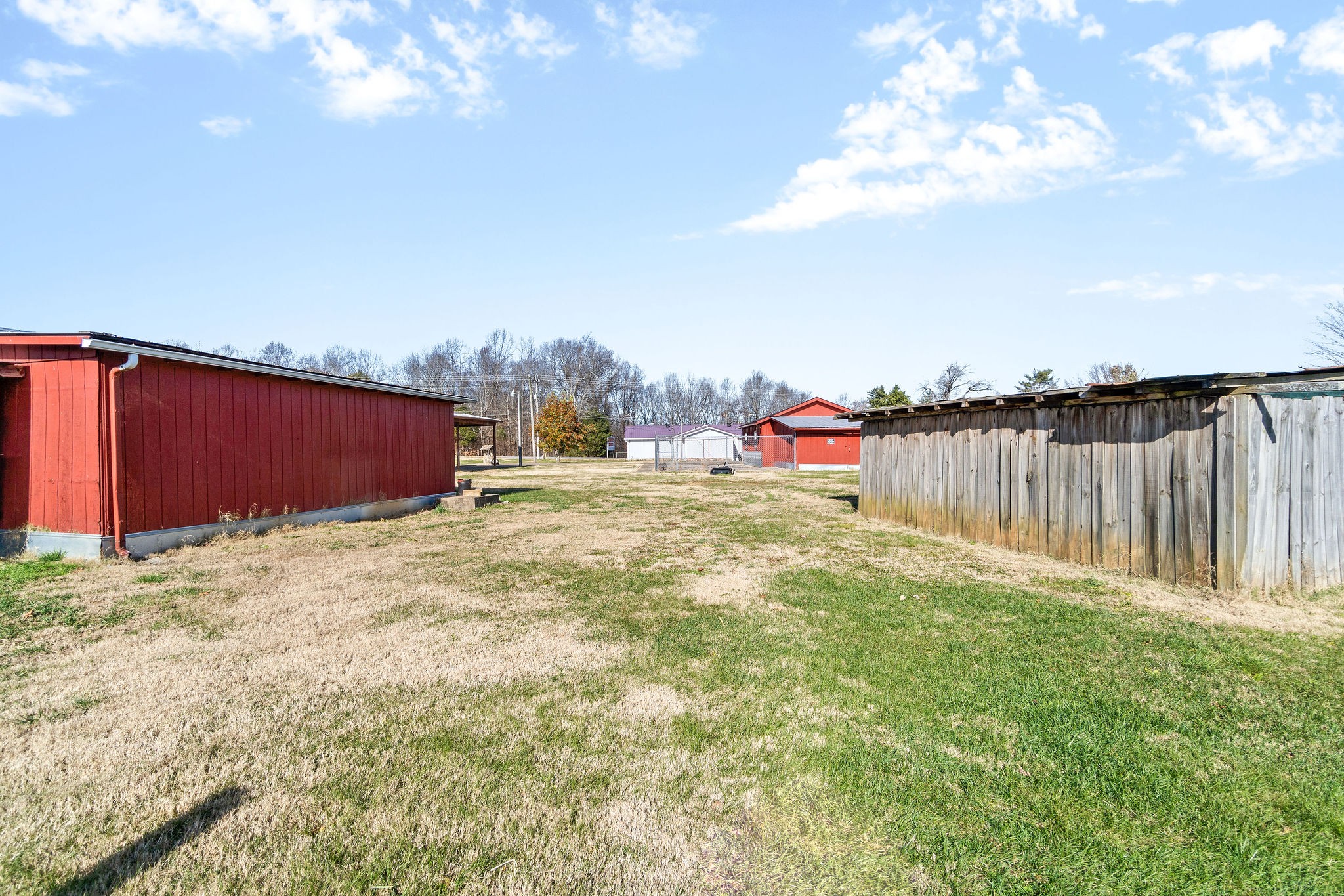 752 Highway 13 Cunningham, TN 37052 - Photo 32 of 32 a backyard of a house with table and chairs