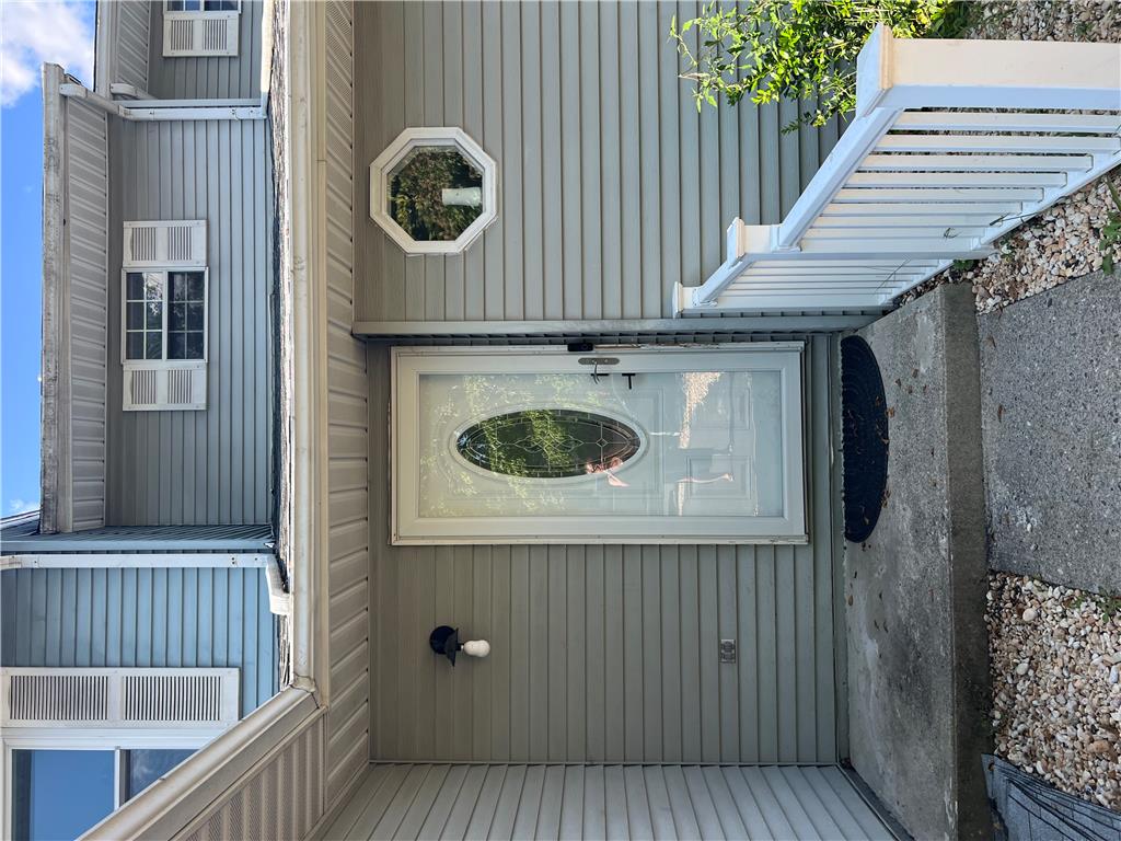 896 Briarstone Road Bethlehem, PA 18017 - Photo 2 of 37 A classic front entry welcomes visitors with vinyl siding and a detailed storm door.